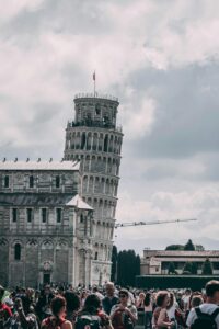 Tourists waiting at Leaning Tower of Pisa tickets office.jpg